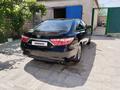 Toyota Camry 2015 года за 10 500 000 тг. в Жанаозен – фото 9