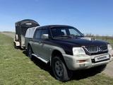 Mitsubishi L200 2005 годаүшін2 500 000 тг. в Аксай