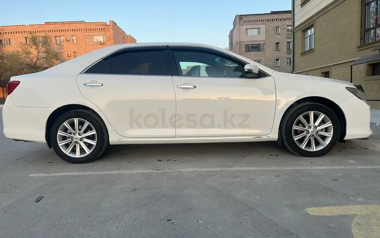 Toyota Camry 2014 года за 11 200 000 тг. в Жанаозен