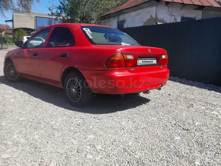Mazda 323 1996 года за 1 150 000 тг. в Талдыкорган – фото 2