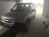 Chevrolet Niva 2013 года за 2 300 000 тг. в Актау – фото 4