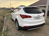 Hyundai Santa Fe 2013 года за 7 700 000 тг. в Актобе – фото 4