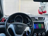 Kia Rio 2015 года за 4 200 000 тг. в Актобе – фото 2