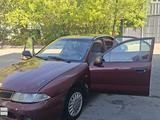 Mitsubishi Carisma 1996 года за 950 000 тг. в Астана – фото 2