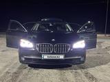 BMW 740 2009 годаfor9 500 000 тг. в Караганда – фото 5