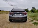 Toyota Camry 2013 года за 9 000 000 тг. в Актобе – фото 2