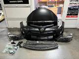 Передний бампер и решётка телевизора Toyota Corolla 180 USA за 20 000 тг. в Алматы