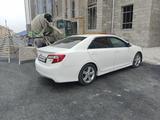 Toyota Camry 2013 года за 6 000 000 тг. в Жанаозен – фото 2