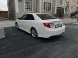 Toyota Camry 2013 года за 6 000 000 тг. в Жанаозен – фото 3
