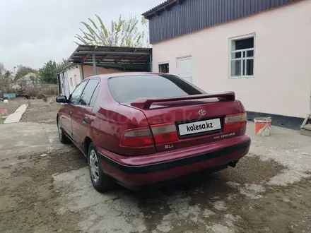 Toyota Carina E 1996 года за 1 500 000 тг. в Иргели – фото 5