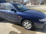 Mazda 626 1999 года за 3 400 000 тг. в Актобе – фото 4