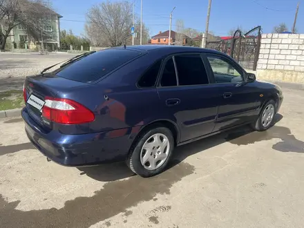 Mazda 626 1999 года за 3 100 000 тг. в Актобе – фото 6