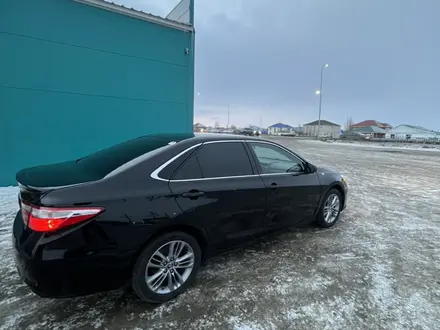 Toyota Camry 2015 года за 7 000 000 тг. в Актобе – фото 7