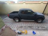Mitsubishi L200 2008 года за 4 600 000 тг. в Шымкент
