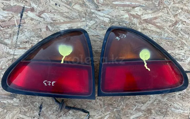 Mazda 323 задние фонари за 1 777 тг. в Актобе