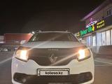 Renault Logan 2014 года за 2 950 000 тг. в Караганда – фото 2