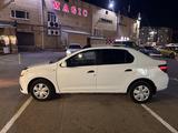 Renault Logan 2014 года за 2 950 000 тг. в Караганда – фото 4