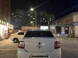 Renault Logan 2014 года за 2 950 000 тг. в Караганда – фото 5
