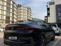 BMW X6 2020 года за 36 500 000 тг. в Алматы – фото 14