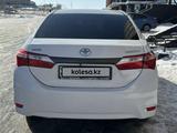 Toyota Corolla 2013 года за 6 700 000 тг. в Актобе – фото 3