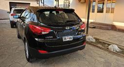 Hyundai Tucson 2012 года за 7 000 000 тг. в Атырау – фото 5