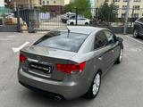 Kia Cerato 2012 года за 4 900 000 тг. в Алматы – фото 2