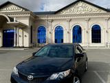 Toyota Camry 2014 года за 6 400 000 тг. в Жанаозен