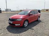 Skoda Rapid 2013 года за 2 700 000 тг. в Атырау – фото 2
