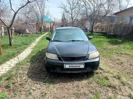 Mazda 323 2002 года за 1 190 000 тг. в Алматы – фото 2
