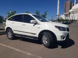 SsangYong Nomad 2013 года за 6 000 000 тг. в Астана – фото 2