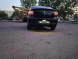 Renault Logan 2014 года за 2 200 000 тг. в Астана – фото 4