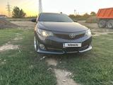 Toyota Camry 2014 годаүшін8 500 000 тг. в Актобе