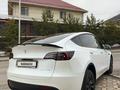 Tesla Model Y 2023 года за 21 000 000 тг. в Алматы – фото 2