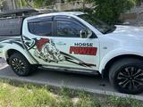 Mitsubishi L200 2014 годаүшін9 200 000 тг. в Алматы – фото 2