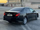 Toyota Camry 2012 года за 9 000 000 тг. в Жанаозен – фото 3