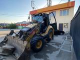 Caterpillar  428 2013 года за 27 000 000 тг. в Шымкент – фото 2