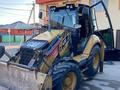 Caterpillar  428 2013 года за 27 000 000 тг. в Шымкент
