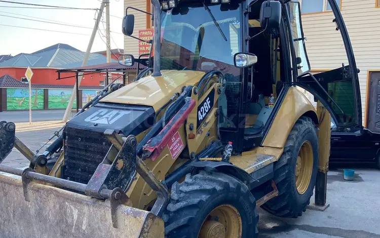 Caterpillar  428 2013 года за 27 000 000 тг. в Шымкент