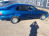 Toyota Carina E 1995 годаүшін800 000 тг. в Актау – фото 3