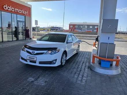 Toyota Camry 2014 года за 5 300 000 тг. в Атырау