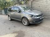 Volkswagen Touran 2010 года за 4 700 000 тг. в Алматы
