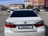 Toyota Camry 2015 годаүшін12 500 000 тг. в Актобе – фото 5