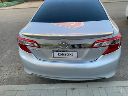 Toyota Camry 2014 года за 6 450 000 тг. в Актобе – фото 2