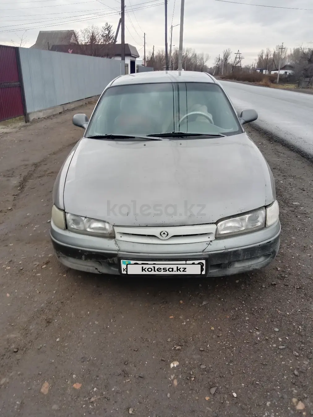 Мазда Cronos, 1992