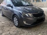 Kia Rio 2015 года за 4 300 000 тг. в Жезказган