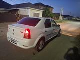 Renault Logan 2012 года за 1 700 000 тг. в Атырау – фото 3