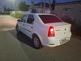 Renault Logan 2012 года за 1 700 000 тг. в Атырау – фото 4