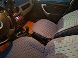 Renault Logan 2012 года за 1 700 000 тг. в Атырау – фото 5