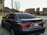 Toyota Camry 2015 года за 7 500 000 тг. в Атырау – фото 4