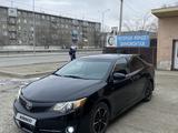 Toyota Camry 2013 года за 9 800 000 тг. в Атырау